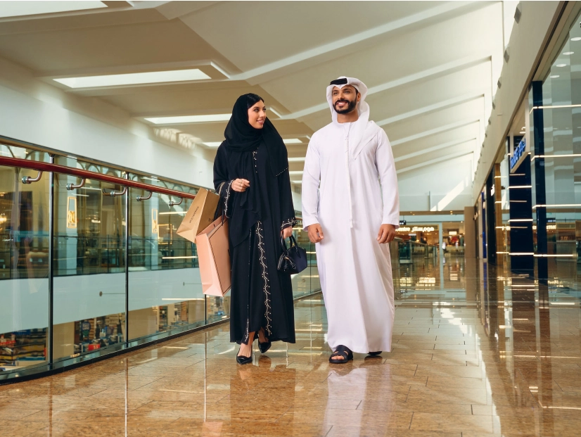 Arab couple shopping in a mall